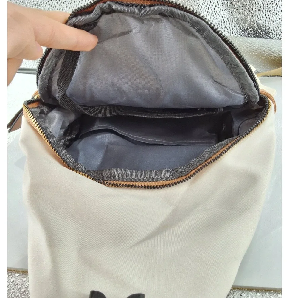Cream Quilted Nylon‎ Sling Bag Unisex Crossbody Backpack Headphone Port